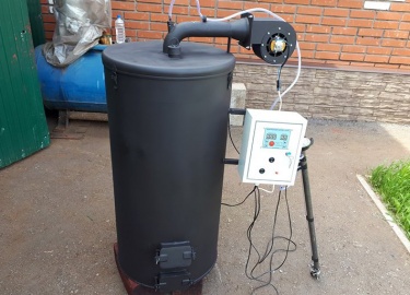 Котел на отработанном масле выделяет тепло, токсичные продукты сгорания не попадают в окружающую среду, а помещение отапливается.