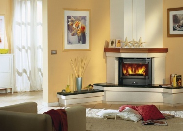 Что нужно учитывать при выборе углового камина в дом, как выглядит камин в интерьере
