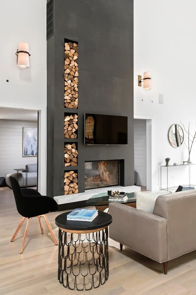 Стильный камин с оригинальными нишами для дров