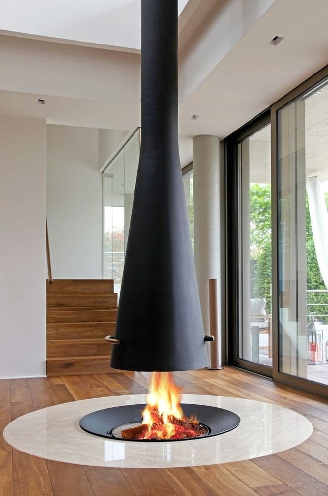 Гармоничное сочетание камина в интерьере гостиной